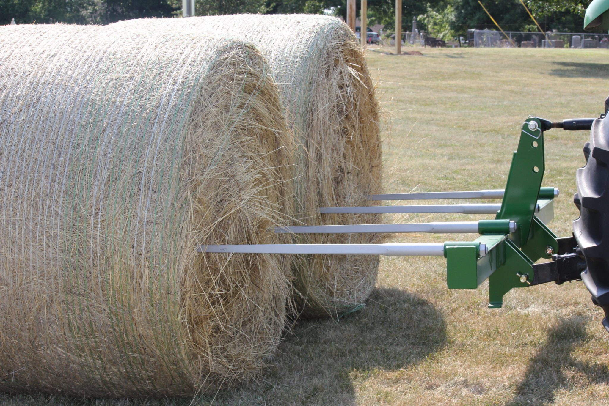 3-Point Two-Bale Mover piercing two big bales